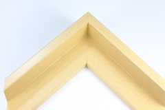 This L-shaped canvas floater frame features a natural finish, with a 1-1/2" depth for artworks.

*Note: These solid wood, custom canvas floaters are for stretched canvas prints and paintings, and raised wood panels.